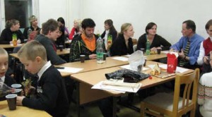 Milos speaks with students at the University of Liberec where he teaches English.